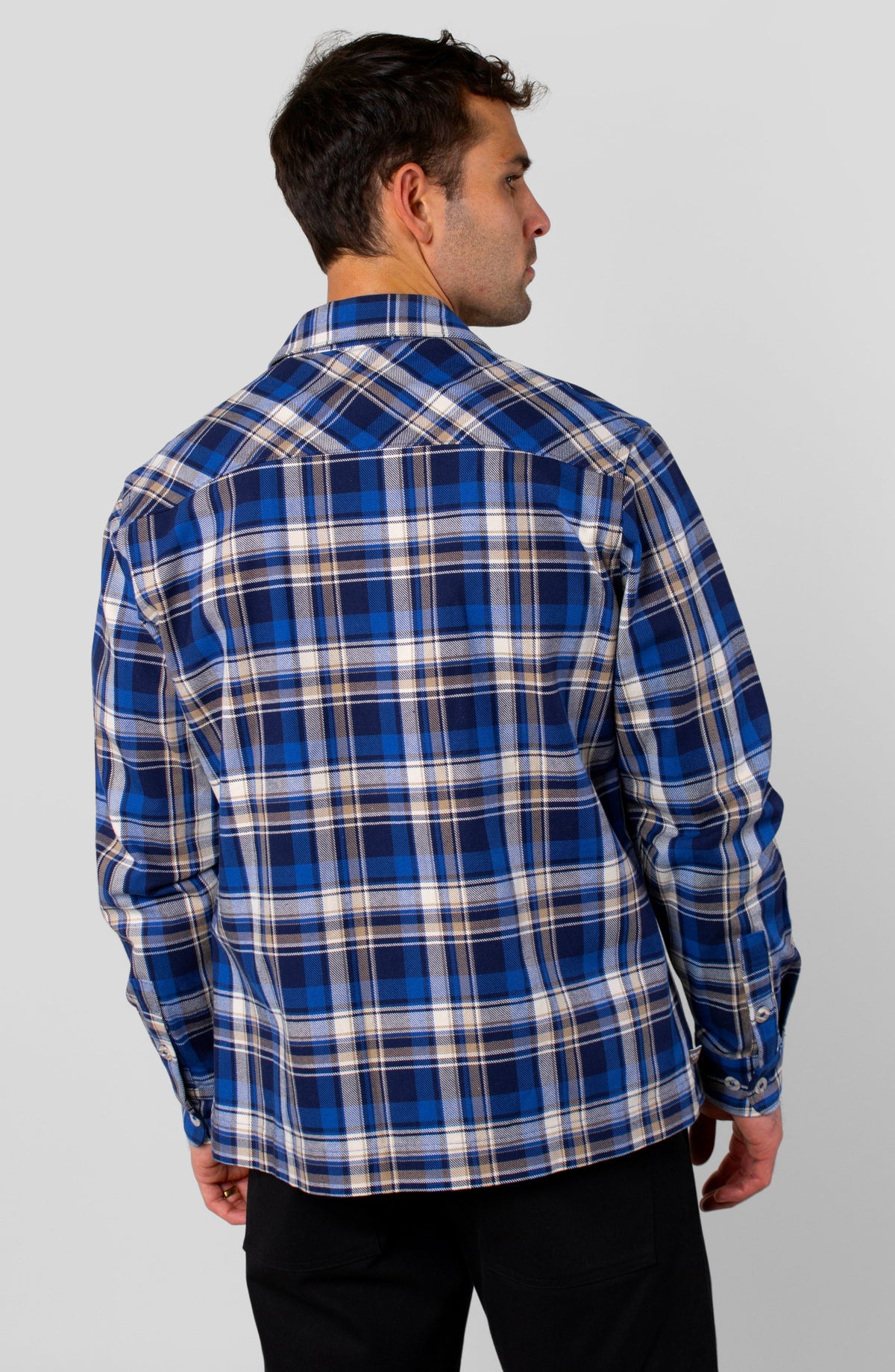 LEISURE LAB® Outlander button-up shirt in blue plaid cotton flannel, back view on a male model.