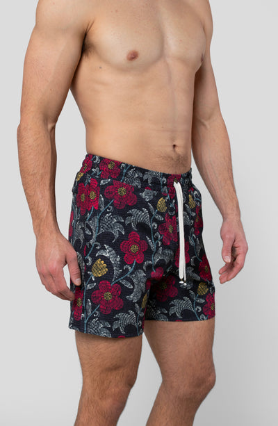 NIGHT BLOOM SWIM TRUNK