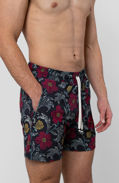 NIGHT BLOOM SWIM TRUNK