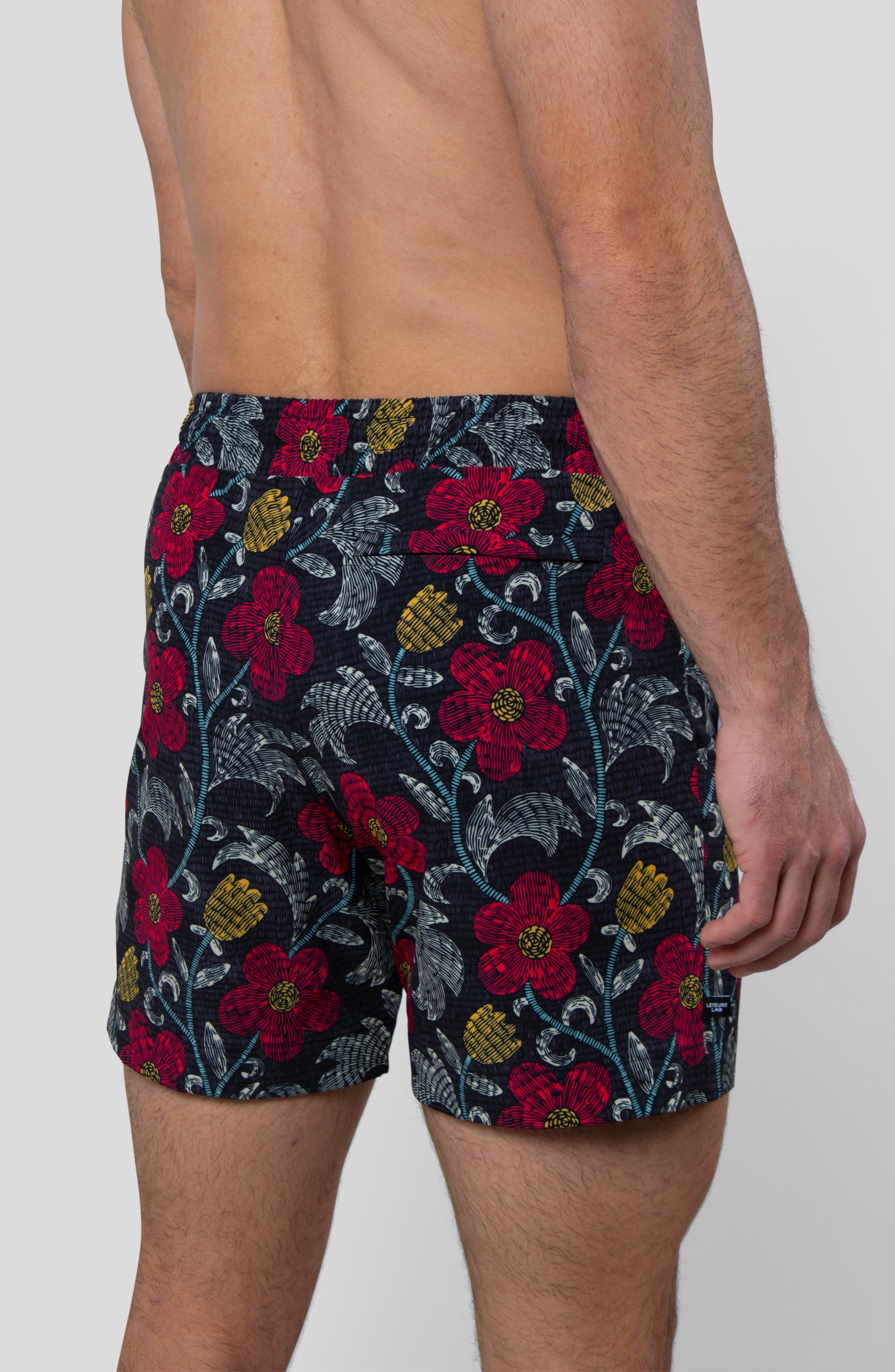 NIGHT BLOOM SWIM TRUNK